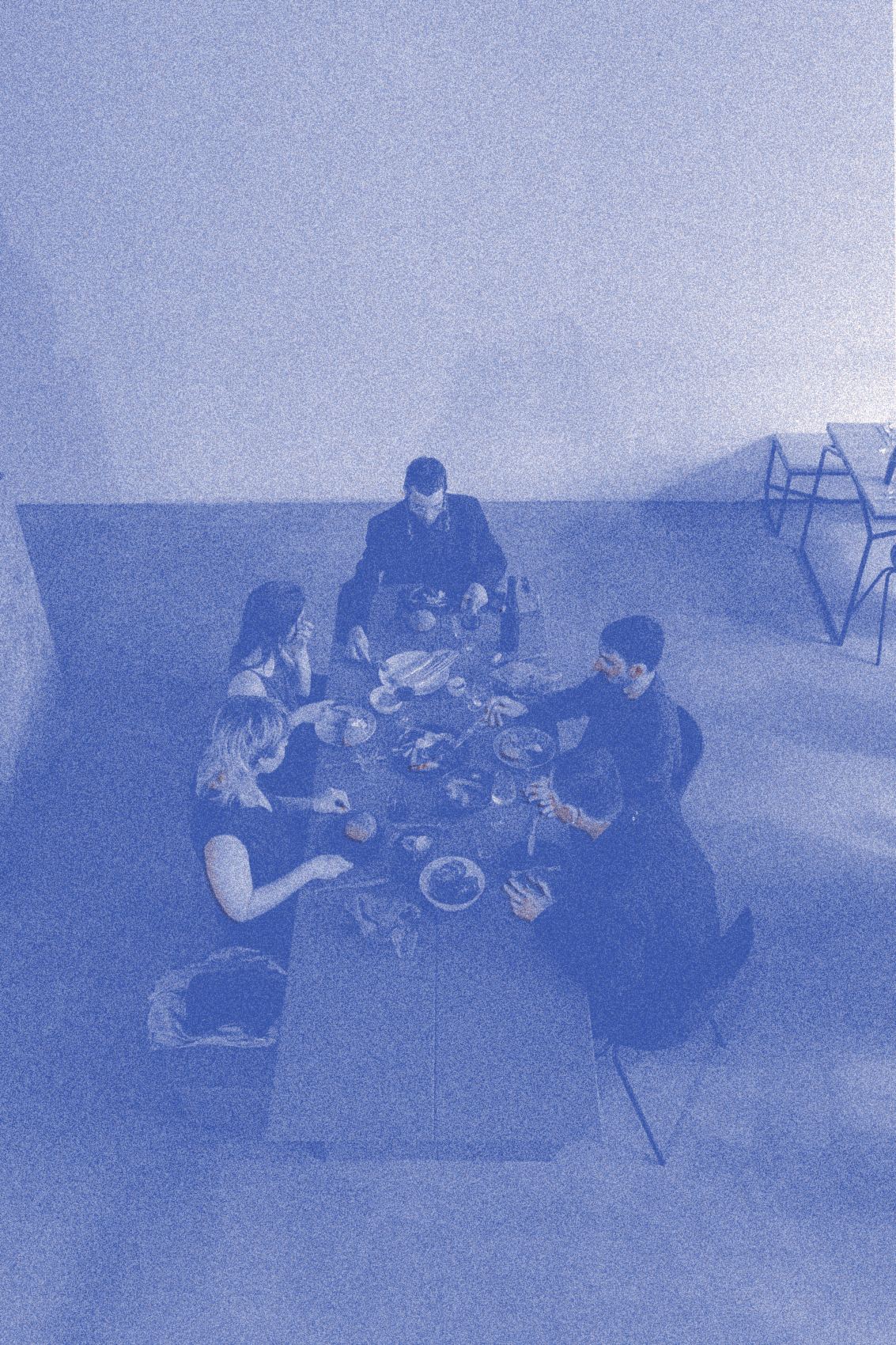 Friends around a long table, seen from above