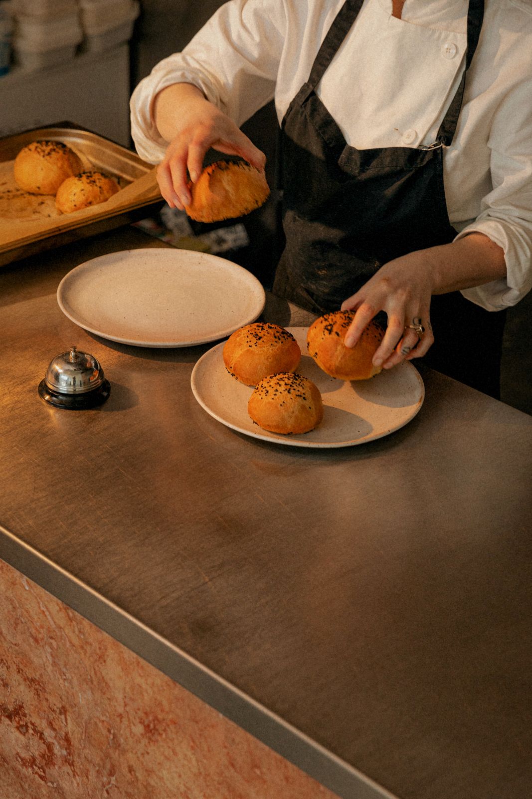 Buns being plated at the pass