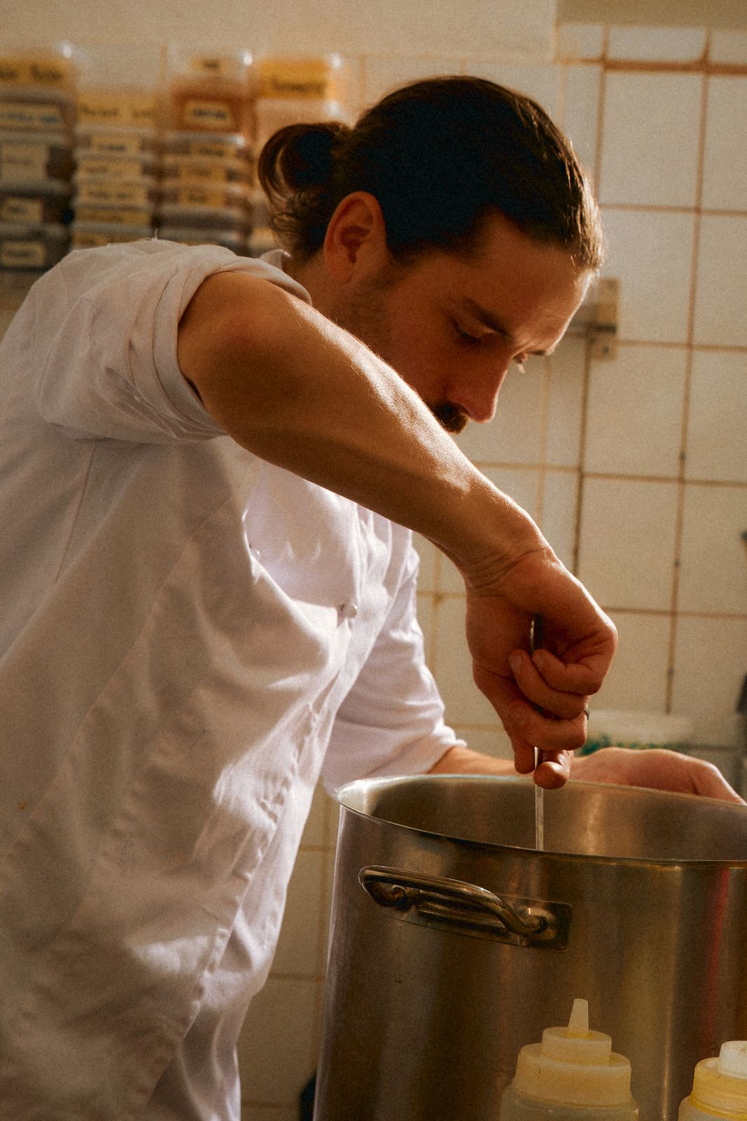 Chef stirring a stock pot
