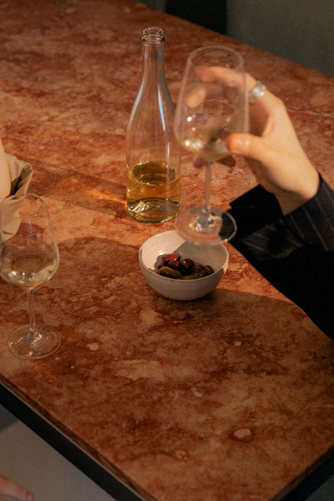 White wine at a marble counter